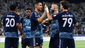 Cristiano-Ronaldo-tengah-dan-Joao-Felix-kanan-melakukan-tos.jpg