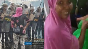 Ibu-Ana-berjilbab-pink-berdiri-di-garis-depan-demo-DPR.jpg
