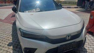 PEMBUNUHAN-NOTARIS-Barang-bukti-mobil-Honda-Civic-berpelat.jpg