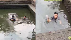 Petugas-Damkar-Depok-menguras-kolam-sedalam-dua-meter-demi-mengevakuasi-iPhone-15-Pro-Max.jpg