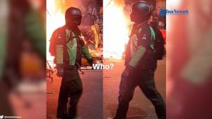 Pria-misterius-berjaket-ojol-saat-pembakaran-Gedung-Grahadi-di-Surabaya.jpg