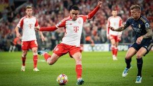 aksi-penyerang-bayern-munchen-jamal-musiala-saat-melawan-real-madrid.jpg