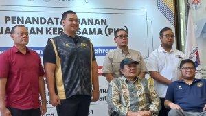 menpora-dito-beserta-jajaranya-foto-bersama-dengan-pengurus-npc-indonesia.jpg