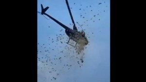 n-uang-menggunakan-helikop.jpg