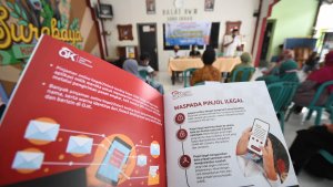 ojk-dan-indah-kurnia-gelar-edukasi-bahaya-pinjol-ke-masyarakat_20211216_014228.jpg