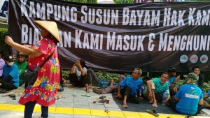 warga-demo-menuntut-segera-menghuni-rusun-bayam_20221206_013610.jpg