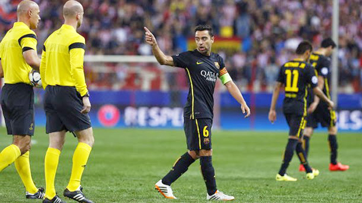 20140410_171716_xavi-hernandez-tunjuk-wasit.jpg