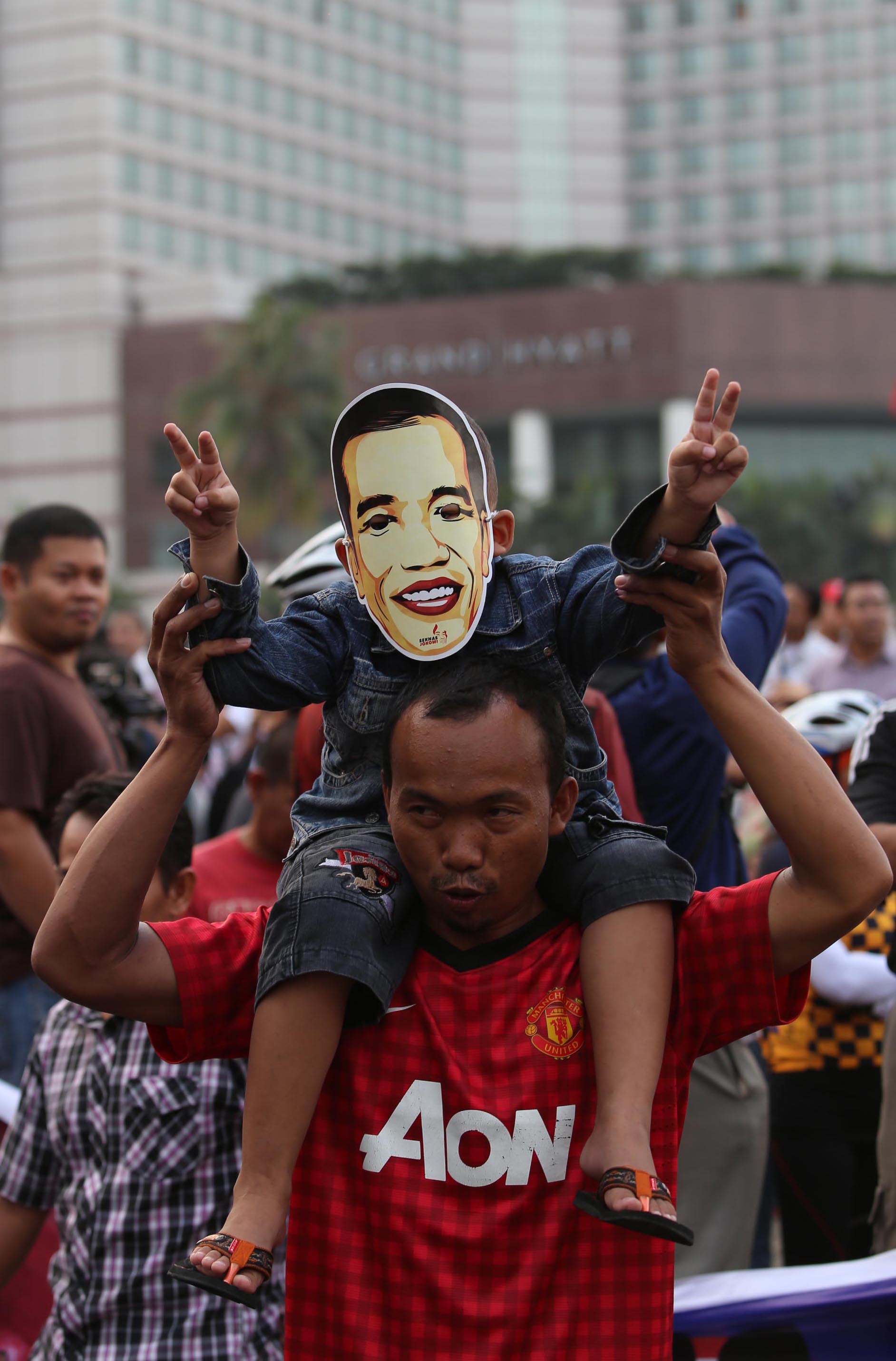 20140709_195205_simpatisan-jokowi-jk-rayakan-kemenangan-di-bundaran-hi.jpg