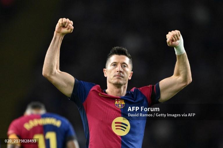 Robert-Lewandowski-dari-FC-Barcelona-merayakan-gol.jpg