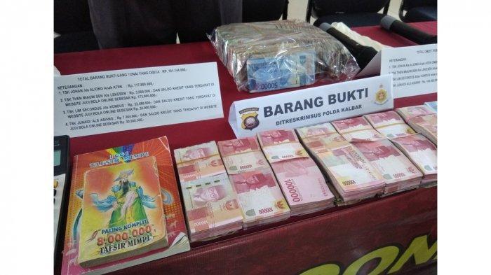 barang-bukti-judi-online-uang-tunai-ratusan-juta-rupiah.jpg
