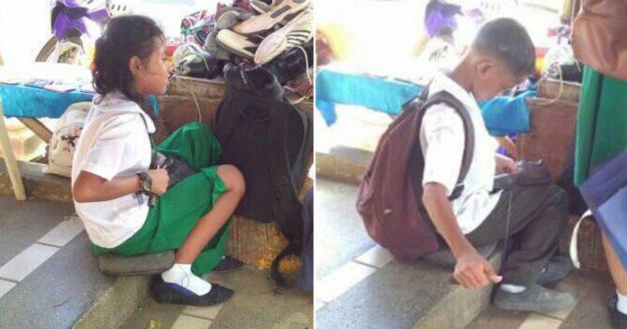 foto-viral-dua-kakak-beradik-sedang-mereparasi-sepatu.jpg