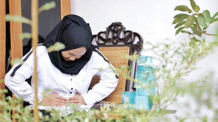 PENUNDA HAID - Ilustrasi nyeri haid. Obat hormon kerapkali disarankan bagi calon jemaah haji perempuan untuk menunda haid.