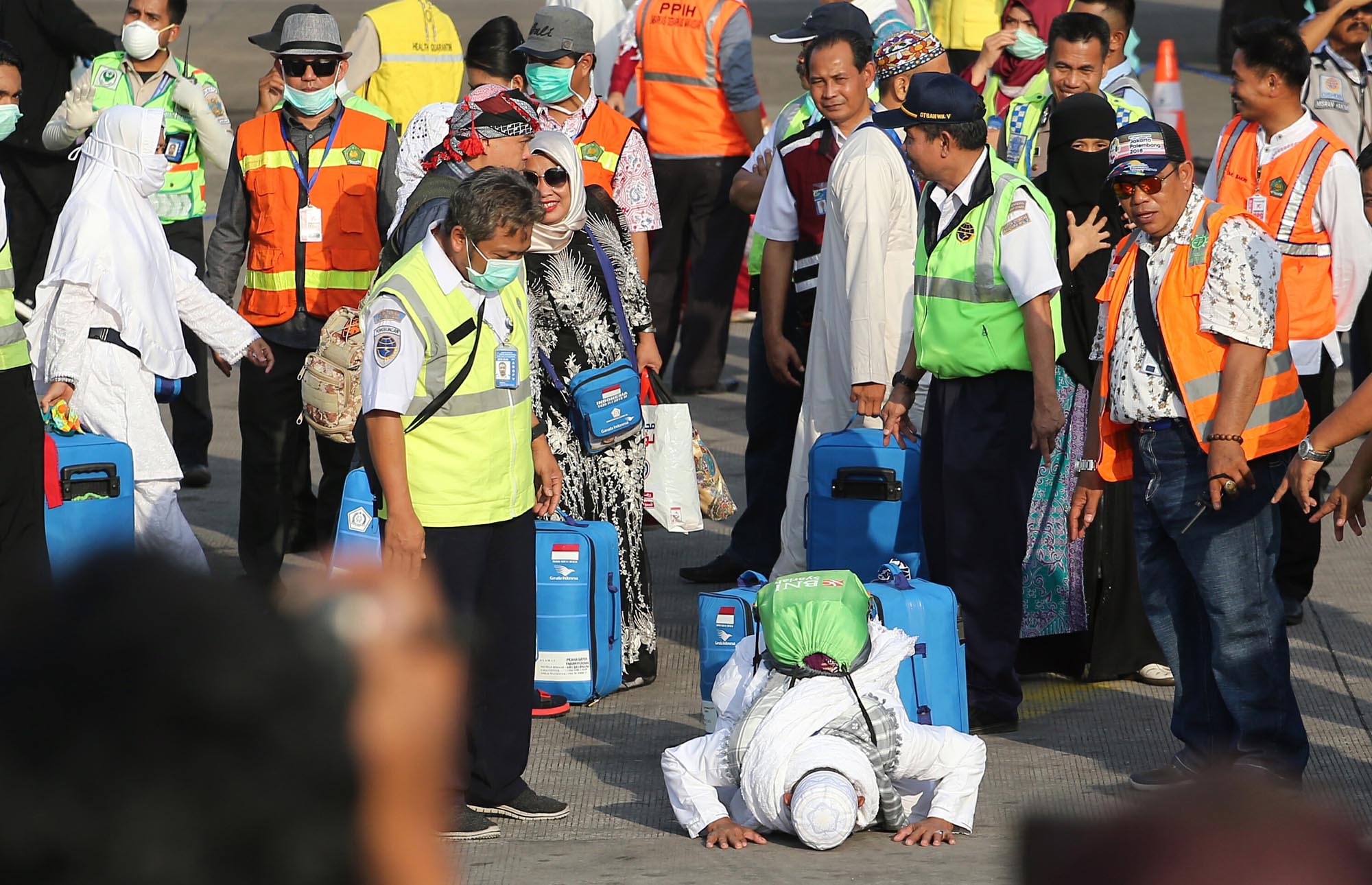 jemaah-kloter-1-tiba-di-bandara-international-sultan-hasanuddin_20180828_220858.jpg