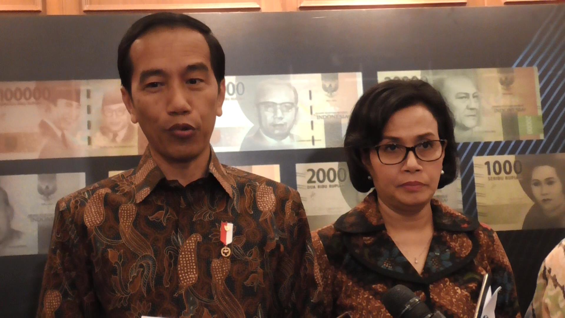 jokowi-didampingi-sri-mulyani-konpers-peluncuran-uang-baru_20161220_142849.jpg