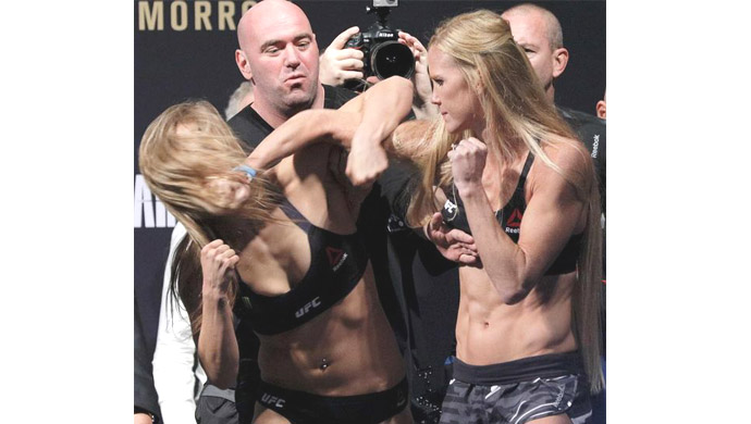 juara-dunia-tarung-campuran-mix-martial-artmma-ronda-rousey_20151115_024021.jpg