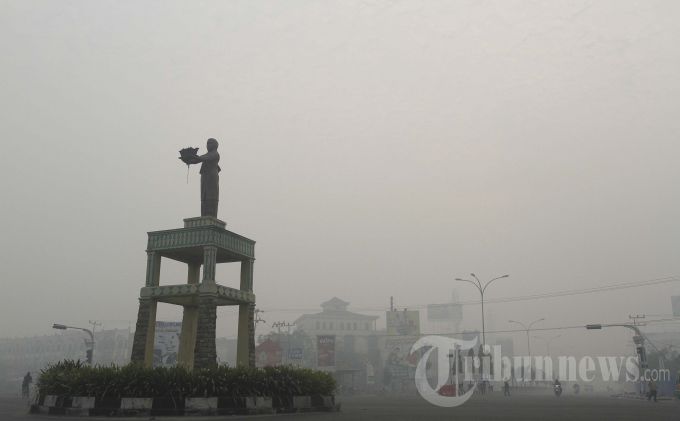 kabut-asap-di-pekanbaru14_20150914_112849.jpg