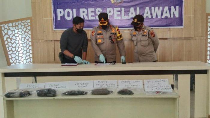 kapolres-pelalawang-ungkap-kasus-pembunuhan-remaja_1.jpg