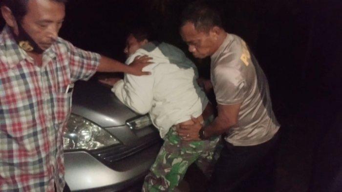 m-saat-digelandang-polisi-karena-mencabuli-anak-tiri.jpg