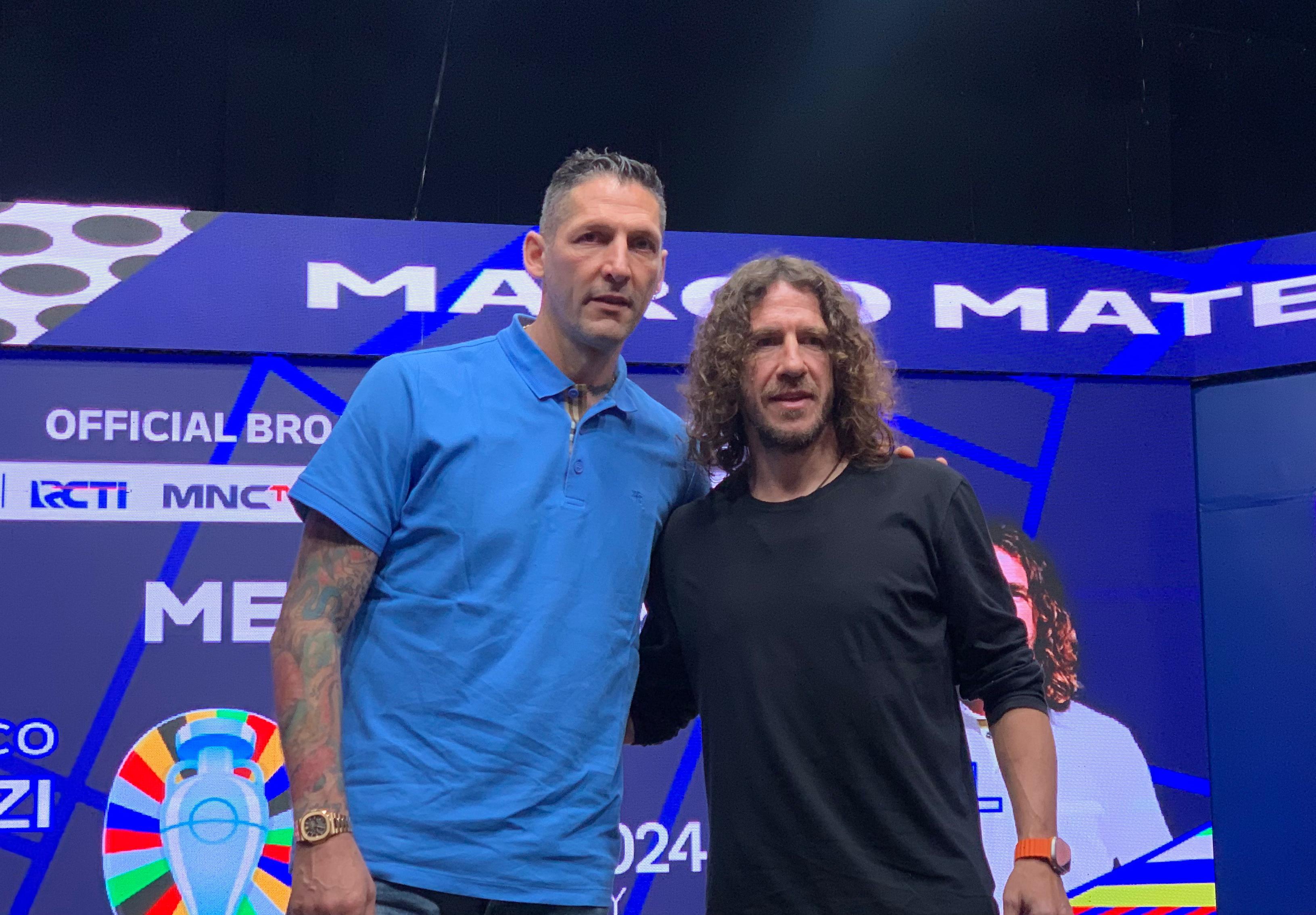 marco-materazzi-dan-carles-puyol-dalam-konferensi-pers.jpg