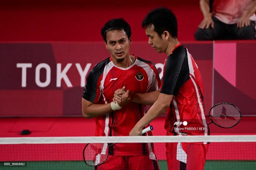 mohammad-ahsan-kiri-dari-indonesia-dan-hendra-setiawan-dari-indonesia-merayakan-kemenangannya.jpg