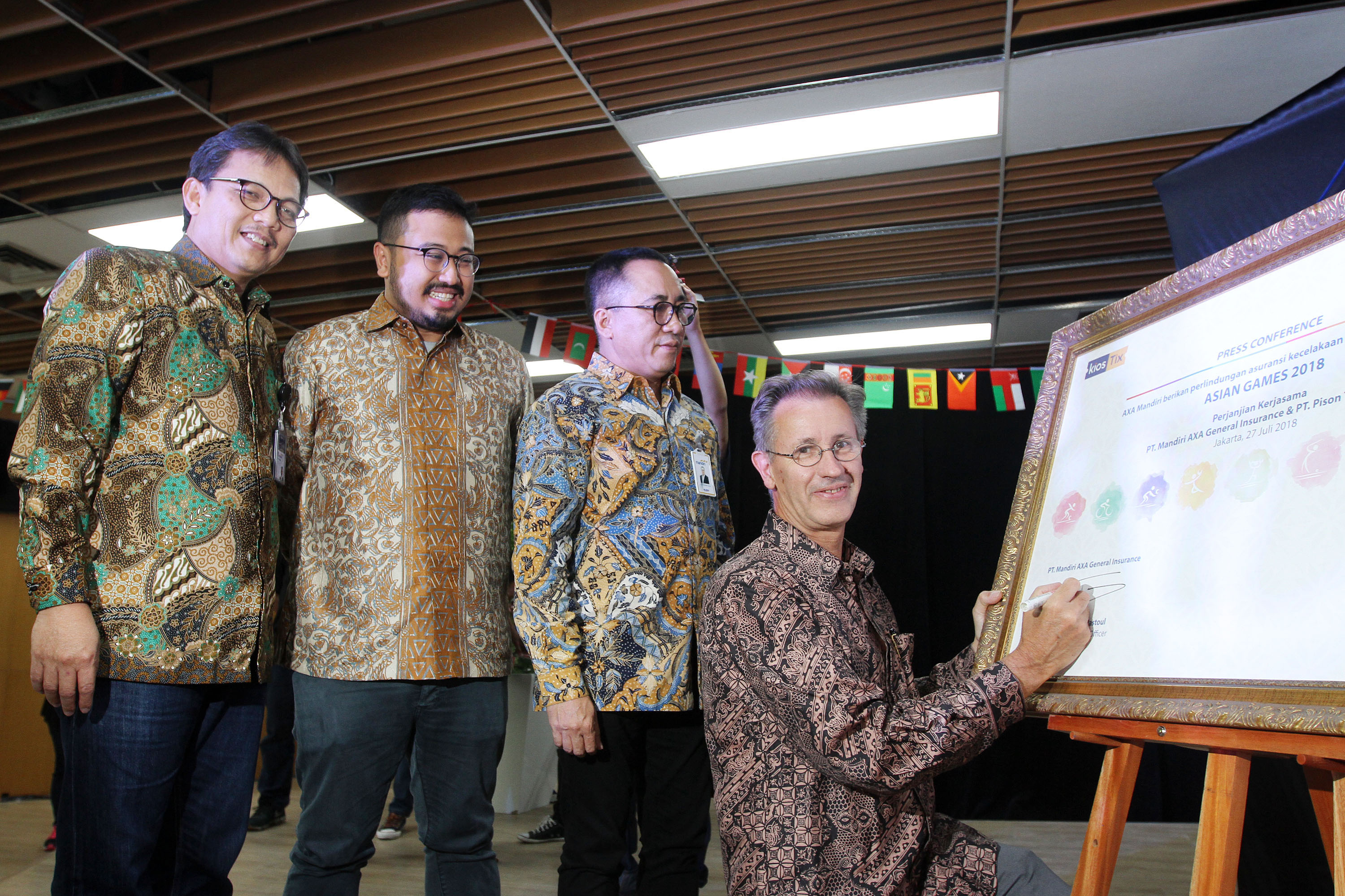 mou-mandiri-axa-dengan-kiostix_20180727_193832.jpg