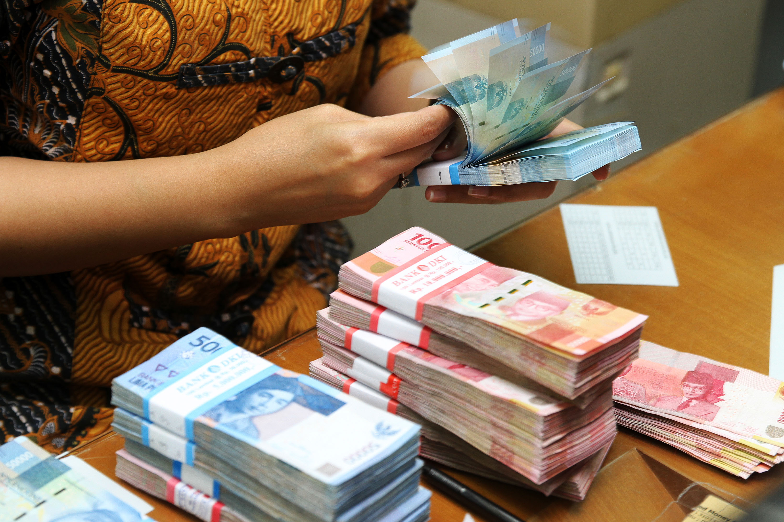 nilai-tukar-rupiah-menguat_20180424_181155.jpg