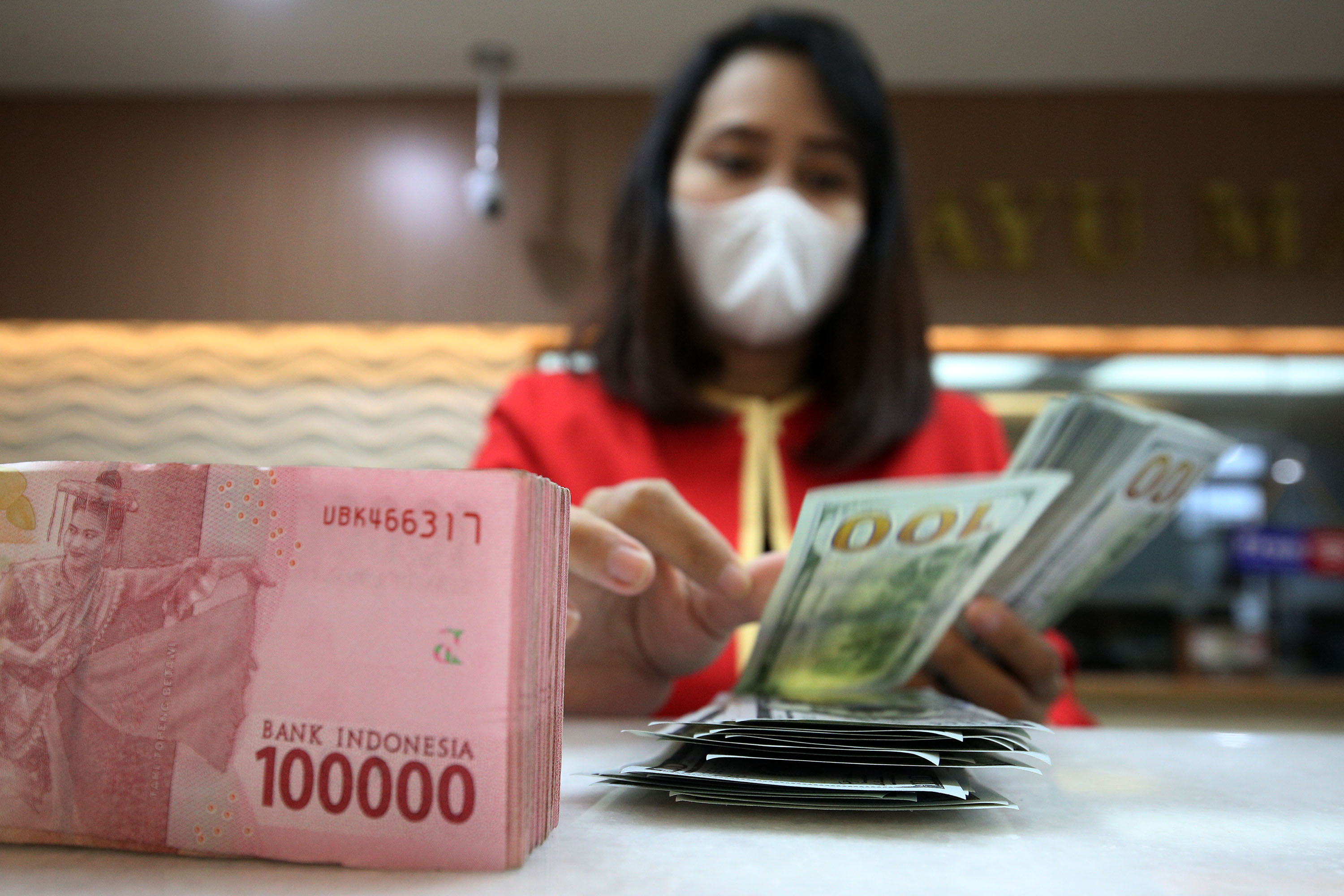 nilai-tukar-rupiah-menguat_20211014_175313.jpg