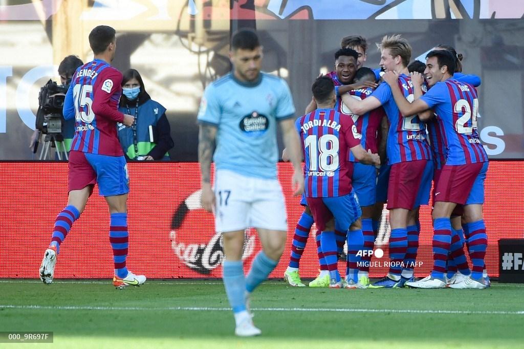 para-pemain-barcelona-merayakan-setelah-mencetak-gol-selama-pertandingan.jpg