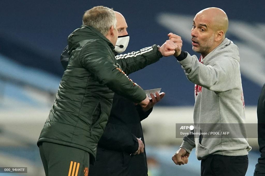 pelatih-manchester-city-pep-guardiola-bersalaman-dengan-pelatih-manchester-united-solskjaer.jpg