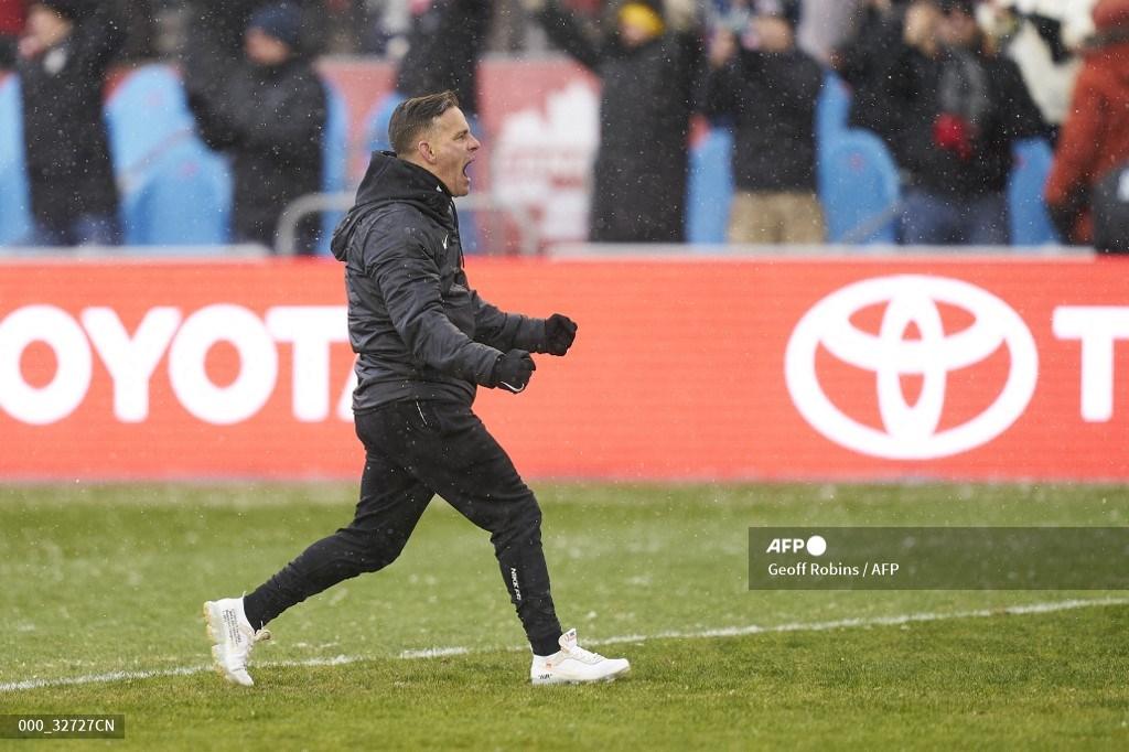 pelatih-sepak-bola-putra-kanada-john-herdman-merayakan-setelah-timnya-mengalahkan-jamaika-4-0.jpg