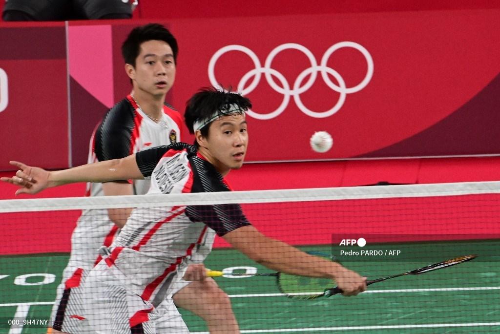 pemain-indonesia-marcus-fernaldi-gideon-melakukan-pukulan.jpg