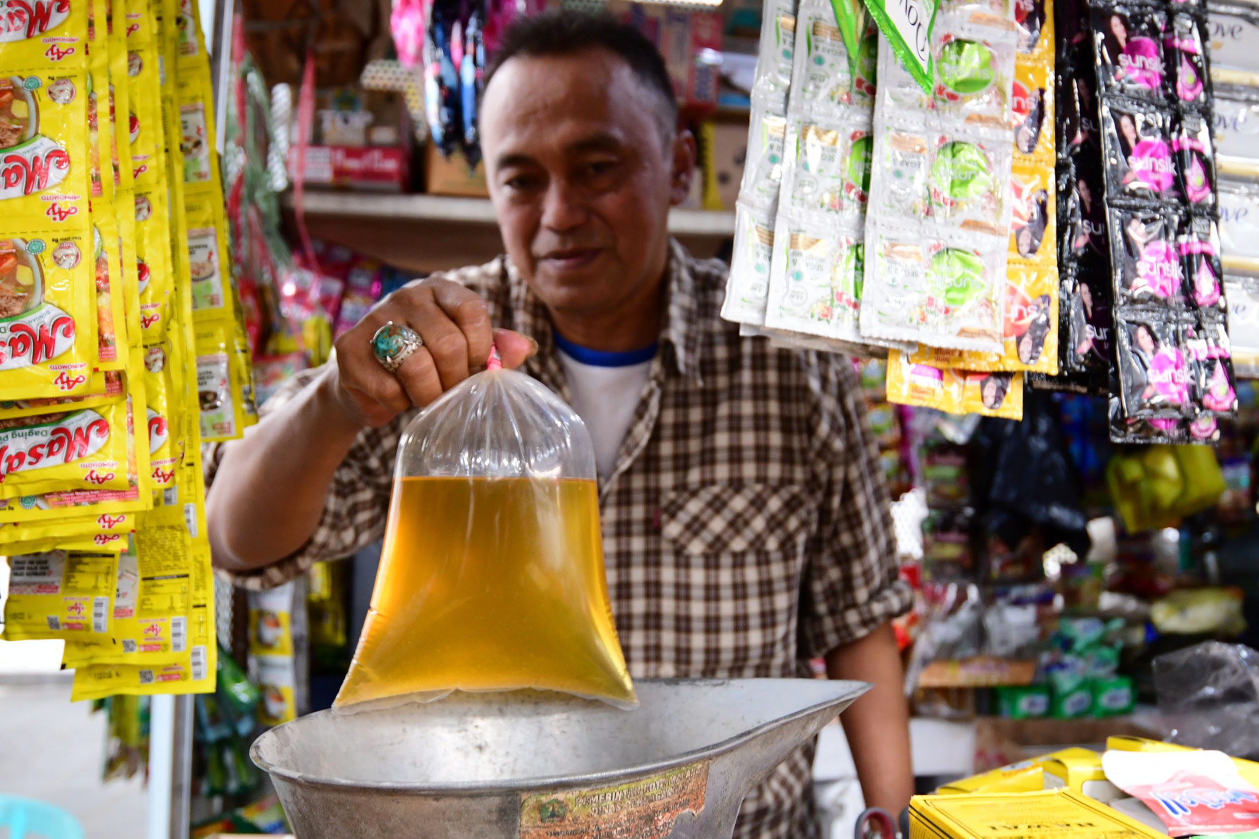 pembelian-minyak-goreng-curah-menggunakan-aplikasi_20220630_173416.jpg