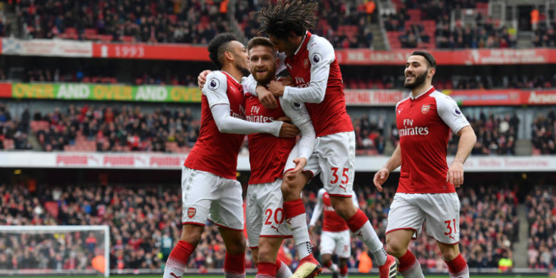 perayaan-gol-pemain-arsenal-shkodran-mustafi_20180312_085609.jpg