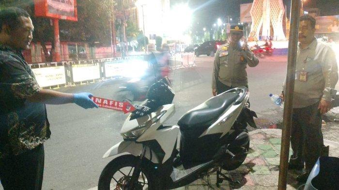 polisi-tendang-kepala-odgj.jpg