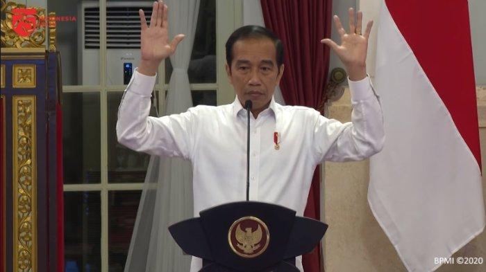 presiden-joko-widodo-jokowi-mengangkat-tangan-setelah-menyampaikan-kemungkinan-reshuffle.jpg
