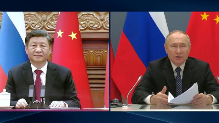 presiden-rusia-vladimir-putin-berbicara-kepada-presiden-china-xi-jinping-33.jpg