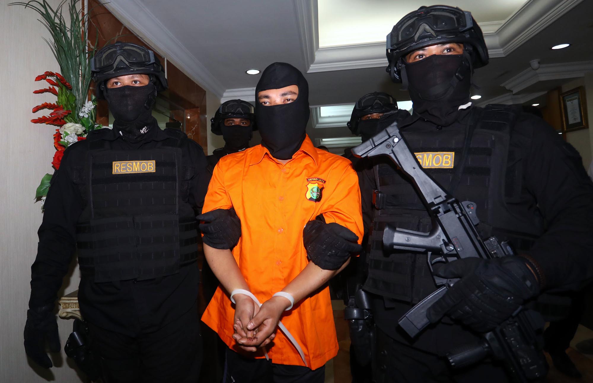 rilis-pembunuhan-satu-keluarga_20181116_180723.jpg