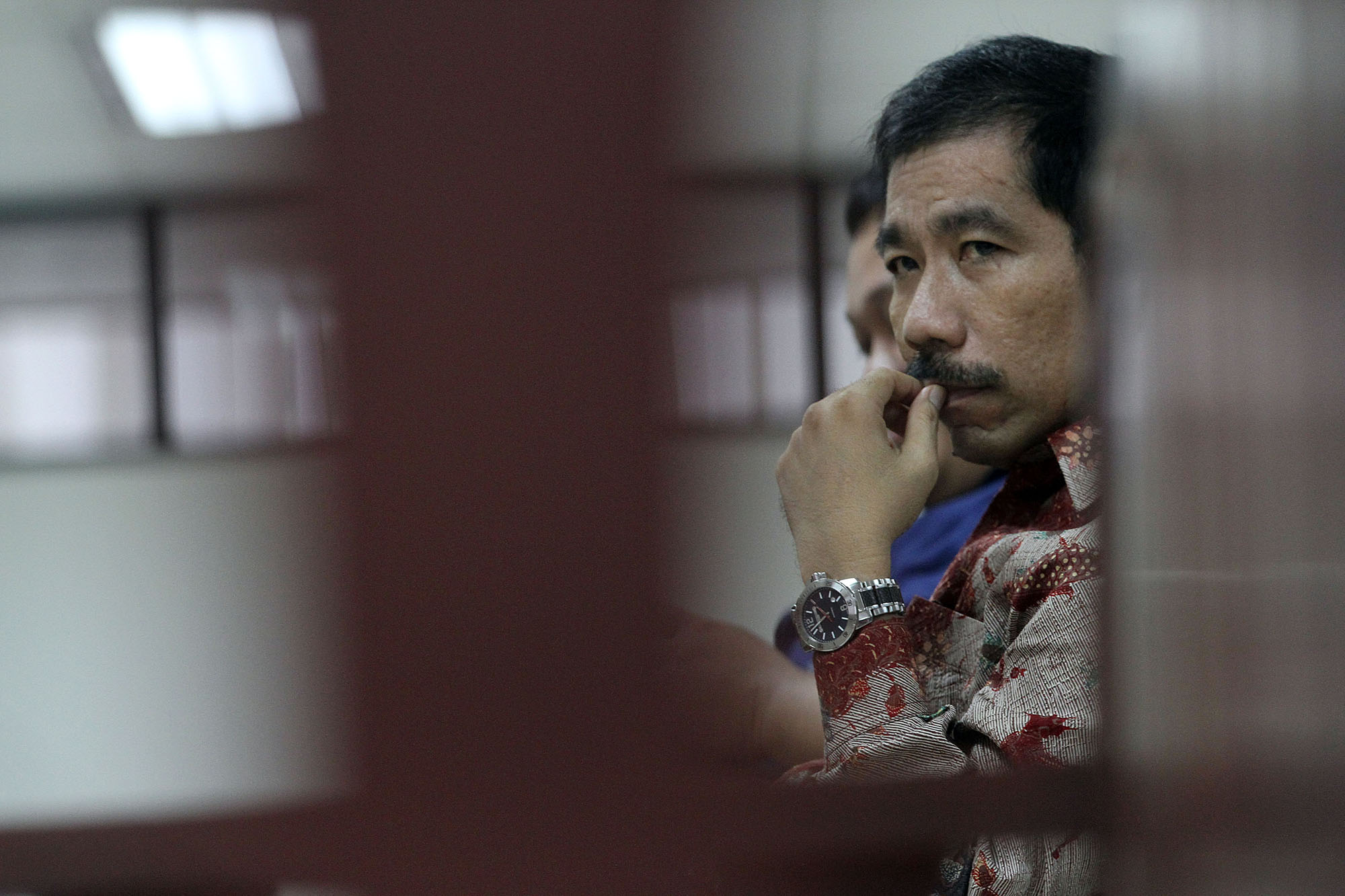 romi-herton-bersiap-jalani-sidang-tuntutan_20150212_200825.jpg