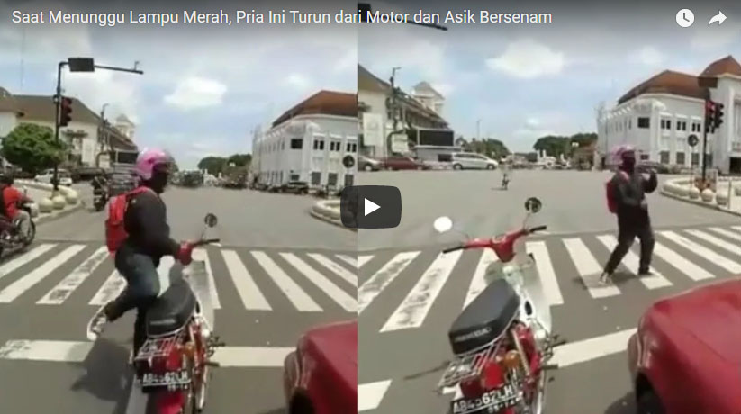 saat-menunggu-lampu-merah-pria-ini-turun-dari-motor-dan-asik-bersenam_20180404_114516.jpg