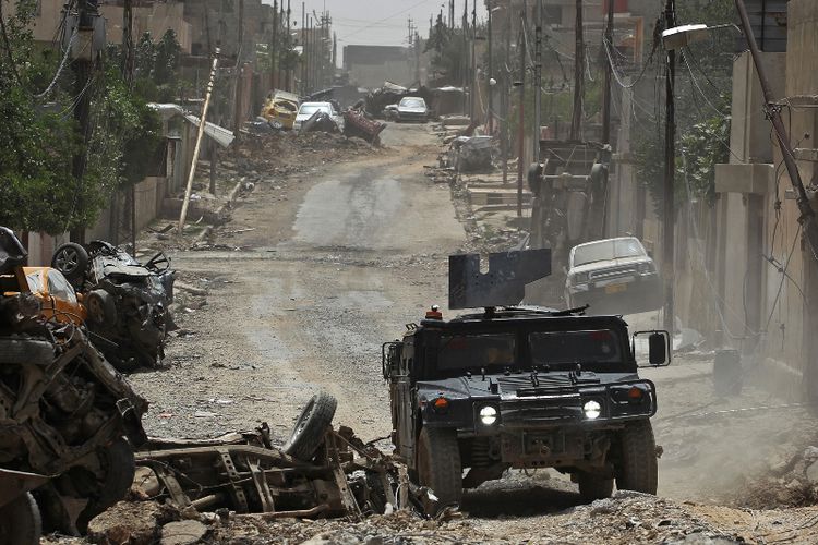 sebuah-kendaraan-tempur-pasukan-irak-di-sisi-barat-kota-mosul_20170516_185446.jpg