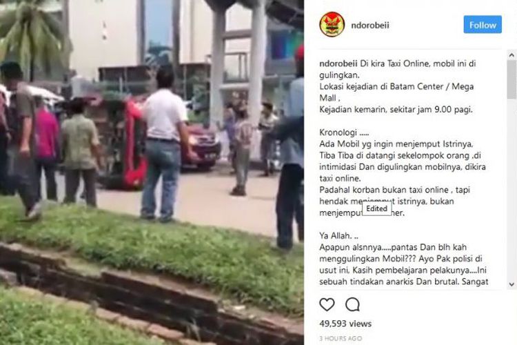 sebuah-mobil-digulingkan-di-batam-karena-diduga-taksi-online_20170922_234435.jpg