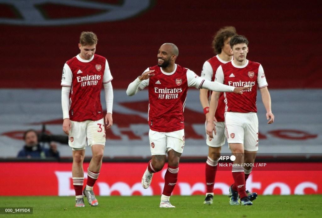 striker-arsenal-prancis-alexandre-lacazette-tengah-merayakan-gol-kedua-timnya.jpg