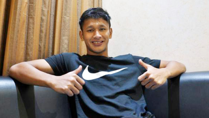 striker-muda-arema-cronus-yang-sedang-dipinjamkan-ke-brisbane-roar-yandi-sofyan-munawar_20141224_134359.jpg