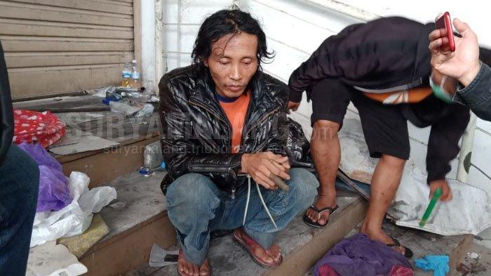 sugeng-terduga-pelaku-mutilasi-di-pasar-besar-malang-1652019.jpg