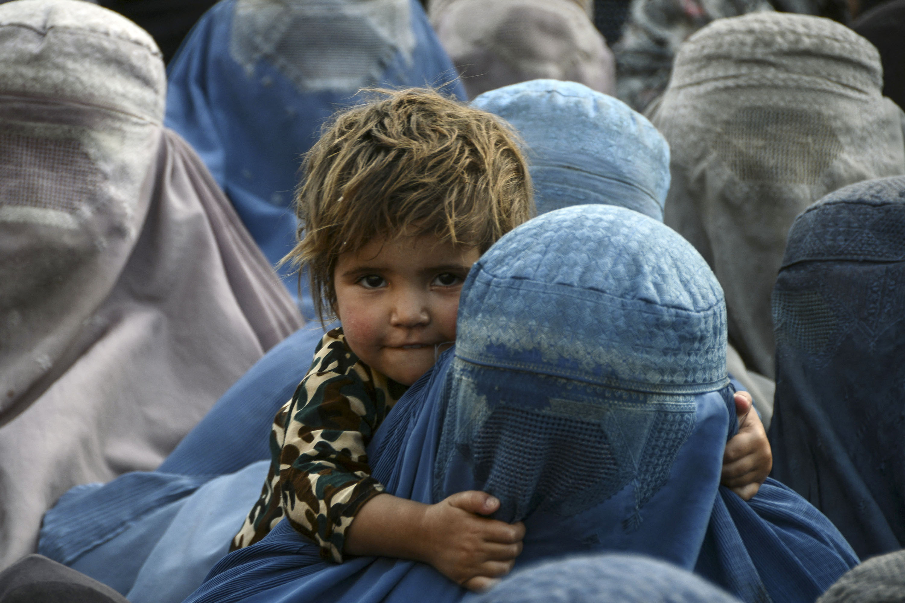 Berita Foto : Melihat Aturan Taliban Wajibkan Perempuan Afghanistan Pakai Burqa