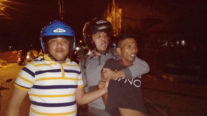 tersangka-pencabulan-anak-di-bawah-umur-rachmad-34-sa.jpg