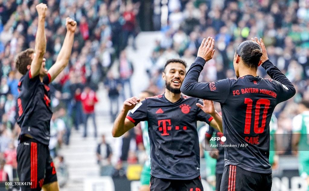 thomas-mueller-noussair-mazraoui-dan-leroy-sane-merayakan-gol.jpg