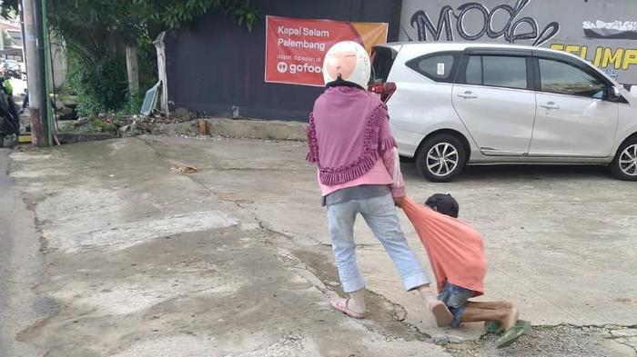 viral-istri-seret-suami.jpg