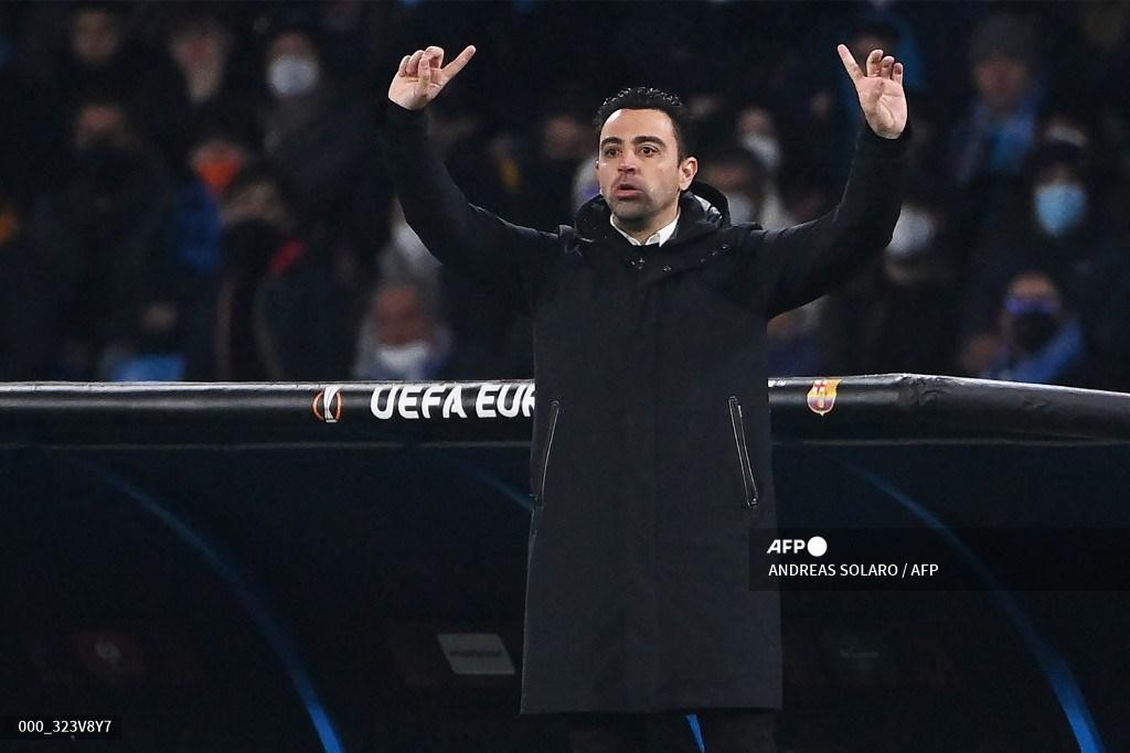 xavi-saat-mendampingi-barcelona-melawan-napoli.jpg