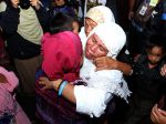20121101_Jamaah_Haji_asal_Palembang_Tiba_Kembali_1453.jpg